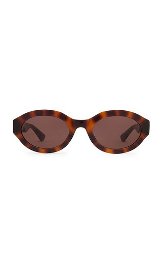 Gucci Oval Sunglasses in Brown. | Revolve Clothing (Global)