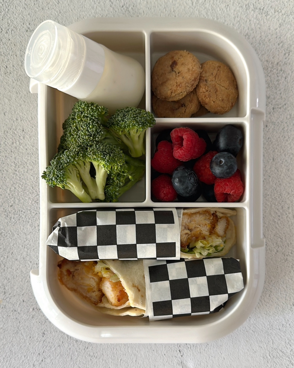 Toddler Lunchbox Idea
Chicken, lettuce, & cheese wraps, berries, broccoli, ranch dip and cookies for a sweet treat!