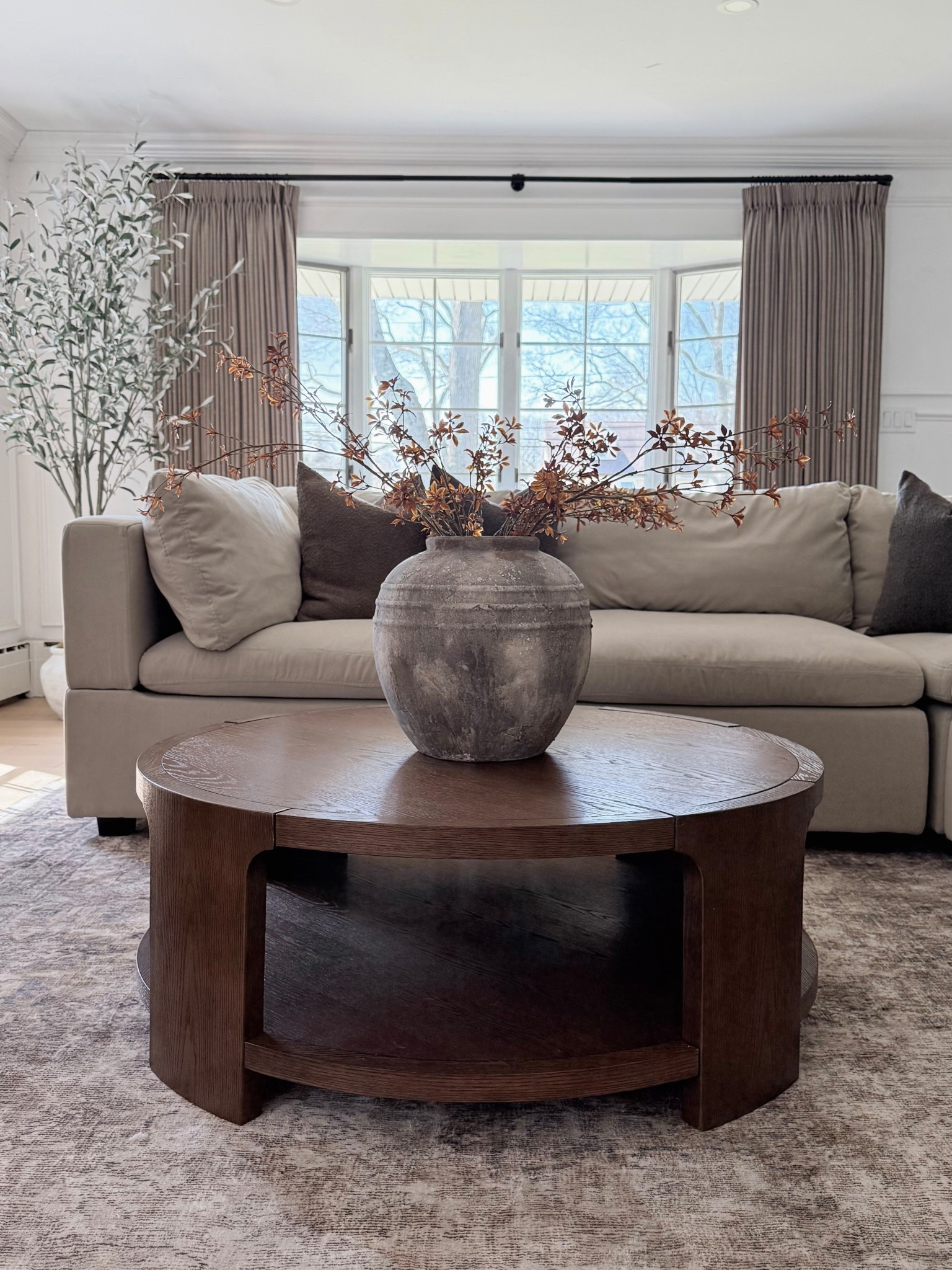 I’m excited to share my new coffee table from @Wayfair It’s a beauty and the perfect size at 42” in diameter. I love the dark wood finish. It has some orange undertones that complements the wood grain very nicely. This budget-friendly find is a great addition to our cozy living room. 

#giftedbywayfair #wayfaircreator

#LTKSaleAlert #LTKHome