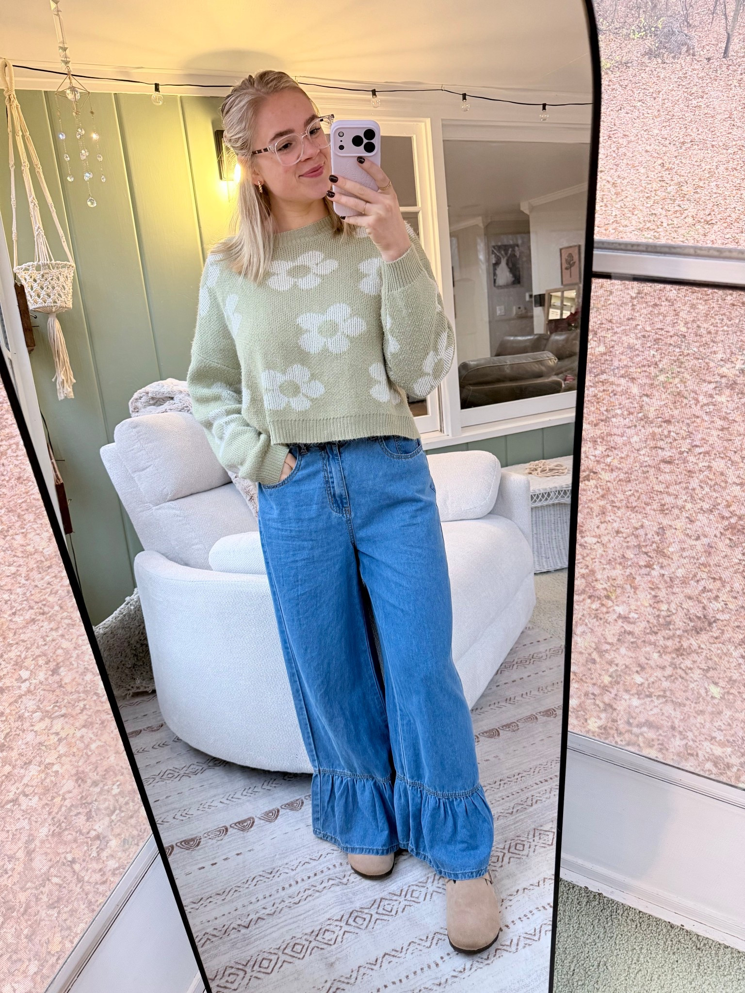 Denim with ruffle hem paired with a floral sweater and clogs! Great fall fit. 

#LTKMidsize