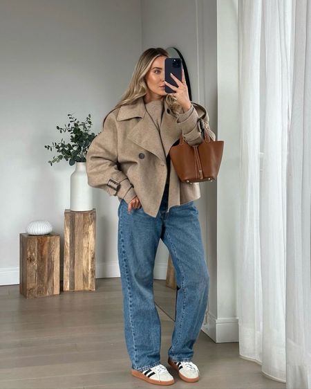 Causal everyday outfit - beige knit jumper, cropped jacket, blue straight leg jeans and adidas spezial trainers  

#LTKSeasonal #LTKeurope #LTKstyletip