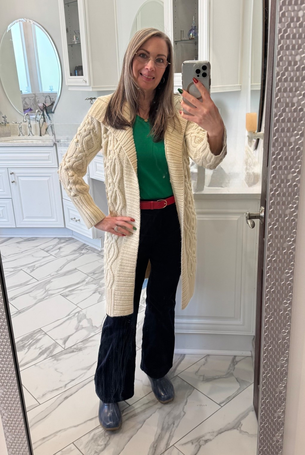 Staying in or going out, this is a very flattering outfit that will keep you warm. I like to wear a red and green theme during the month of December. Navy blue pairs very well with these two colors.

It doesn’t need to be a rainy day to wear your Sperry’s. I debated on pairing them with this outfit, but it works.

The skinny flare cords from Loft are extremely comfortable. Im wearing and average size 4 for extra length. And, I can’t tell you how many times I’ve worn this cardigan. It’s great for going out or lounging around the house. Im wearing the green v-next tee from Talbots in a size petite S. Red belt in a size S. 
#petite #holiday #redandgreen #cardigan #hocspring 

#LTKOver40 #LTKmomlife #LTKootd