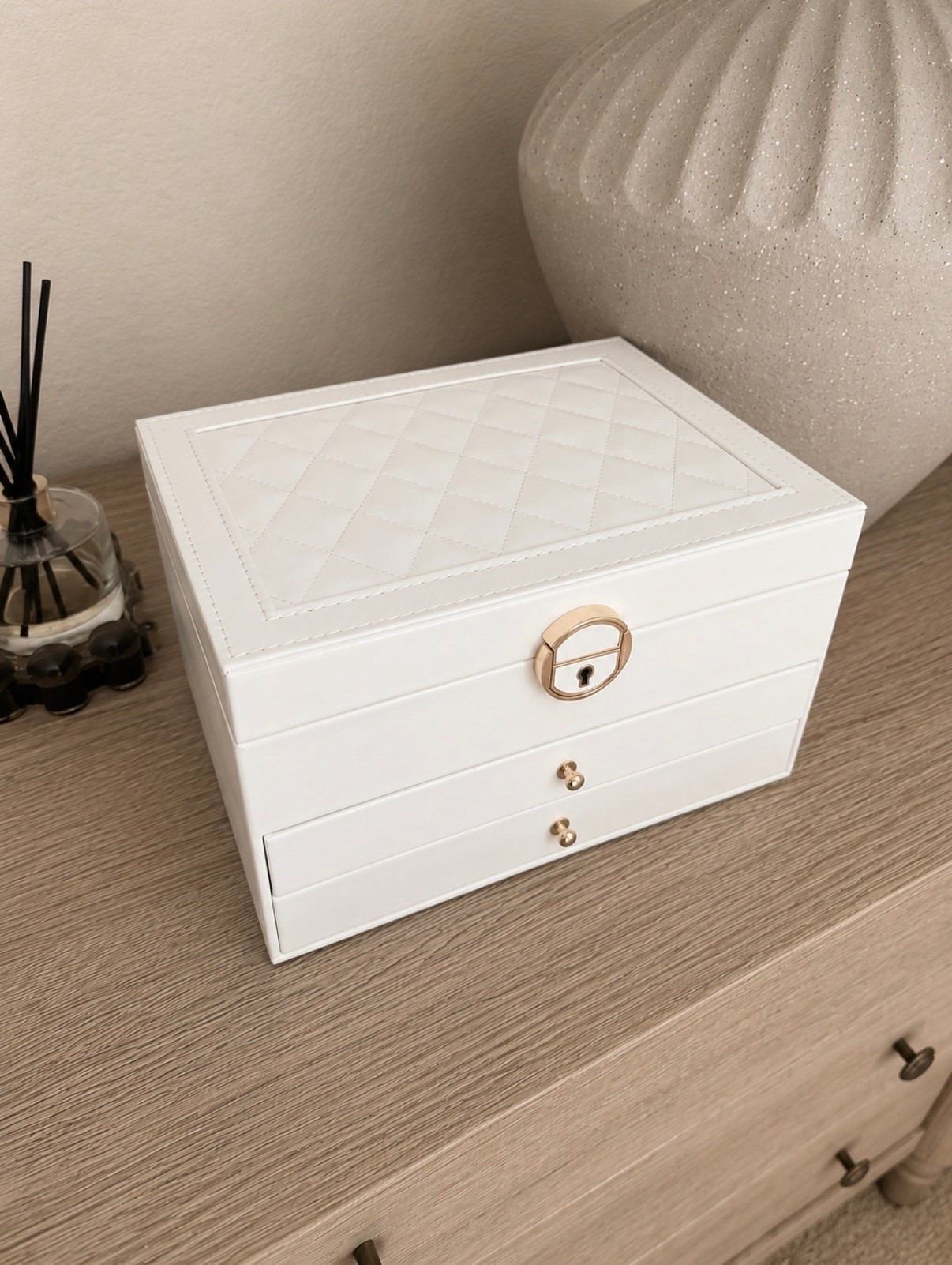 ✨ $25 luxury-look jewelry box and I’m so impressed! 🤍

I desperately needed a better way to organize my jewelry, and this ended up being such a good find.

✔ 3 layers of storage
✔ Necklace hooks to help prevent tangles
✔ Compartments for rings, earrings, bracelets, and watches
✔ Locking top compartment
✔ Luxury look for under $30
✔ Available in 3 color options

Grab the white while it’s still on sale! 🙌 It looks so much more expensive than the price tag and makes getting ready feel so much more organized.

Sometimes the best home upgrades are the little organization finds that make everyday life feel less cluttered. ✨

#LTKSaleAlert #LTKHome #LTKmomlife