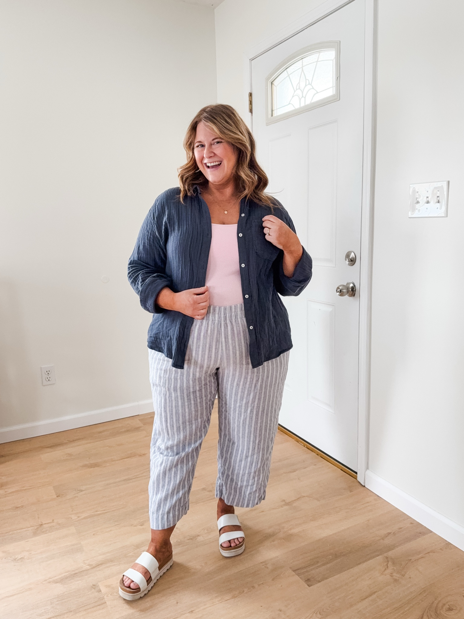 Wearing an XL in my linen pants (petite friendly at the regular length). XL in my tank and a large in my gauze button down  

#LTKSeasonal #LTKMidsize #LTKWorkwear
