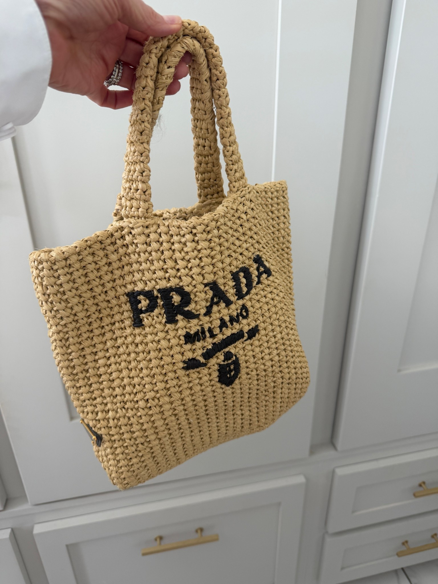 Small crochet Prada tote. Love and have in both sizes! Linking looks for less also 

#LTKOver40