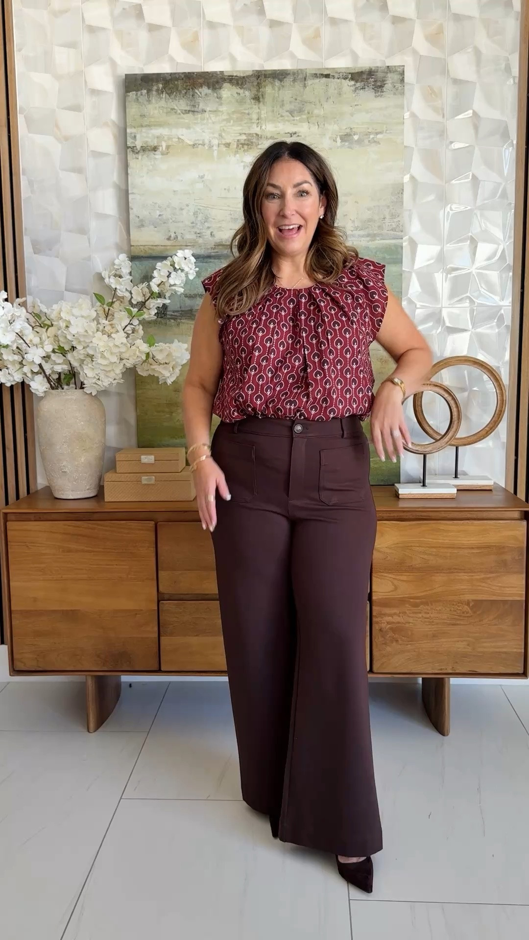 This navy cardigan and burgundy geometric print blouse, paired with wine wide-leg trousers, a brown top-handle bag, and burgundy suede pumps is perfect for fall! 
📏Wearing pant 12 (size up if in between), Top L, Cardigan L,

#LTKOver40 #LTKMidsize #LTKWorkwear
