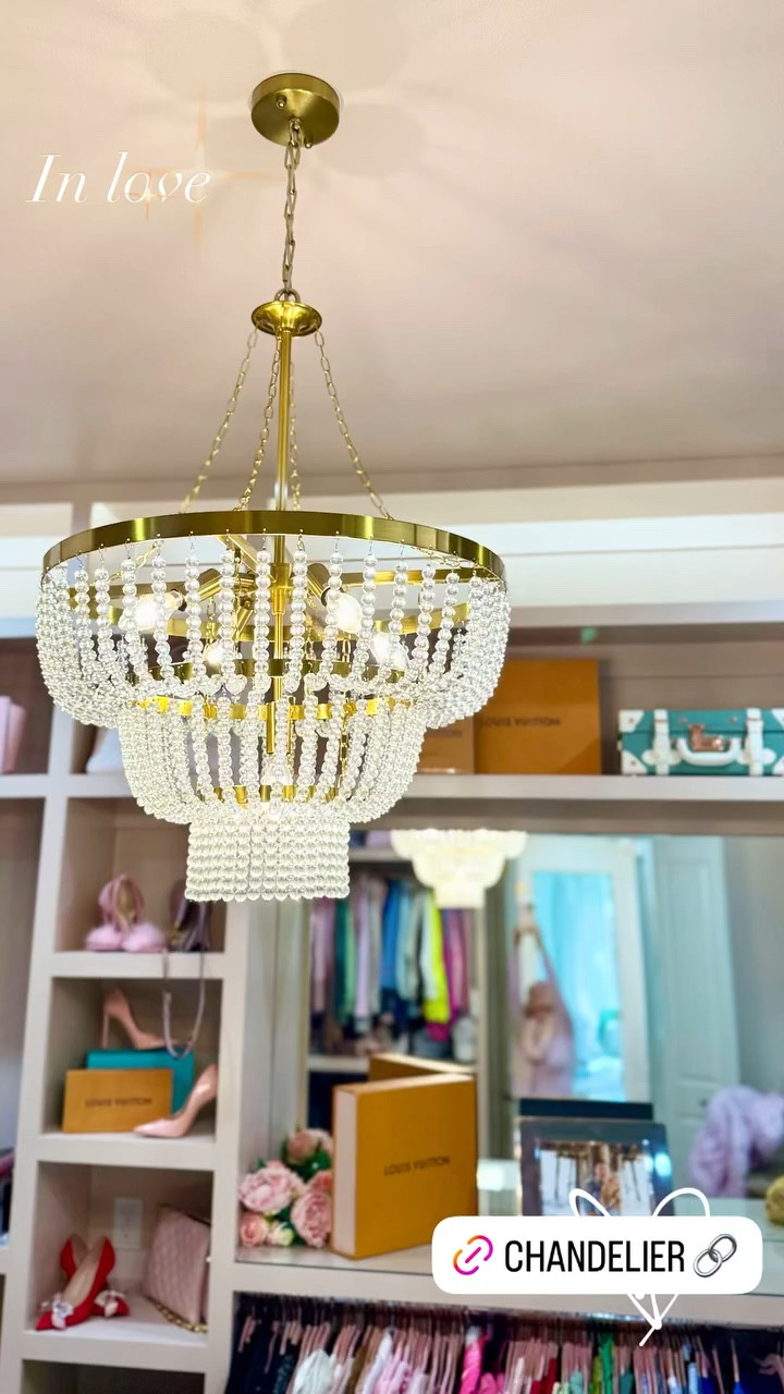 I'm absolutely in love with my new crystal chandelier from Amazon! ✨ The stunning brass finish adds the perfect touch of elegance to my closet, instantly elevating the space. Not only does it brighten up the room, but it also brings a luxurious feel. Such a great find! 💗

#LTKStyleTip #LTKHome