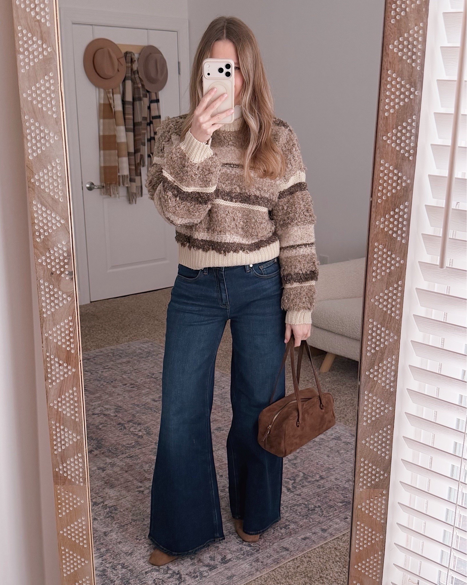 I reach for this sweater on days I want something cozy that still looks put together. The texture does all the work so I barely have to think about the rest.

striped winter sweater, cozy knit, wide leg jeans, casual winter  style over 40, effortless everyday outfit, neutral wardrobe staples, winter fashion 2025

#LTKOver40 #LTKdayinmylife #LTKHoliday