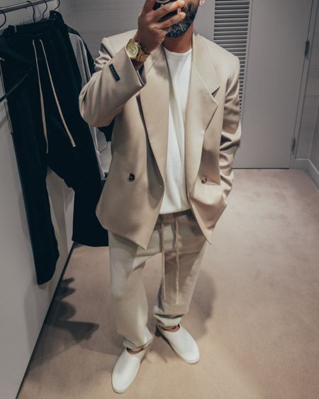 FEAR OF GOD Eternal Collection Double-Breasted Cavalry Wool-Twill Suit Jacket in ‘Beige’ (size 48), 3/4 Sleeve Wool Sweater in ‘Cream’ (size M), Classic Cotton Jersey Sweatpants in ‘Cement’ and California slides in ‘Greige’ (size 41). A relaxed and elevated men’s look that’s layered and perfect for a Spring date night out. 

#LTKstyletip #LTKmens