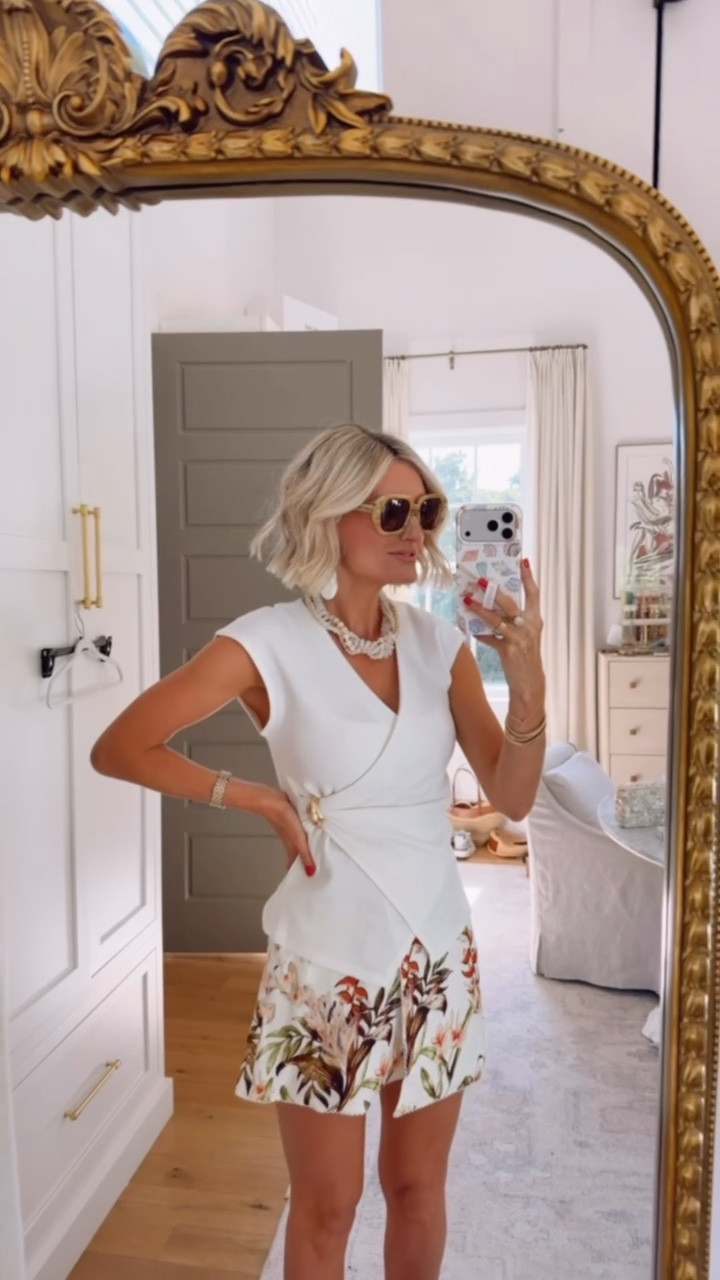 This white wrap top is so versatile and will be ￼such a great go to for styling summer looks! Currently is on sale! Wearing XS in both 

Loverly grey, Anthropologie, white wrap v neck top, floral linen skirt, resort wear, women’s vacation outfits, fashion for her

#LTKSeasonal #LTKSaleAlert