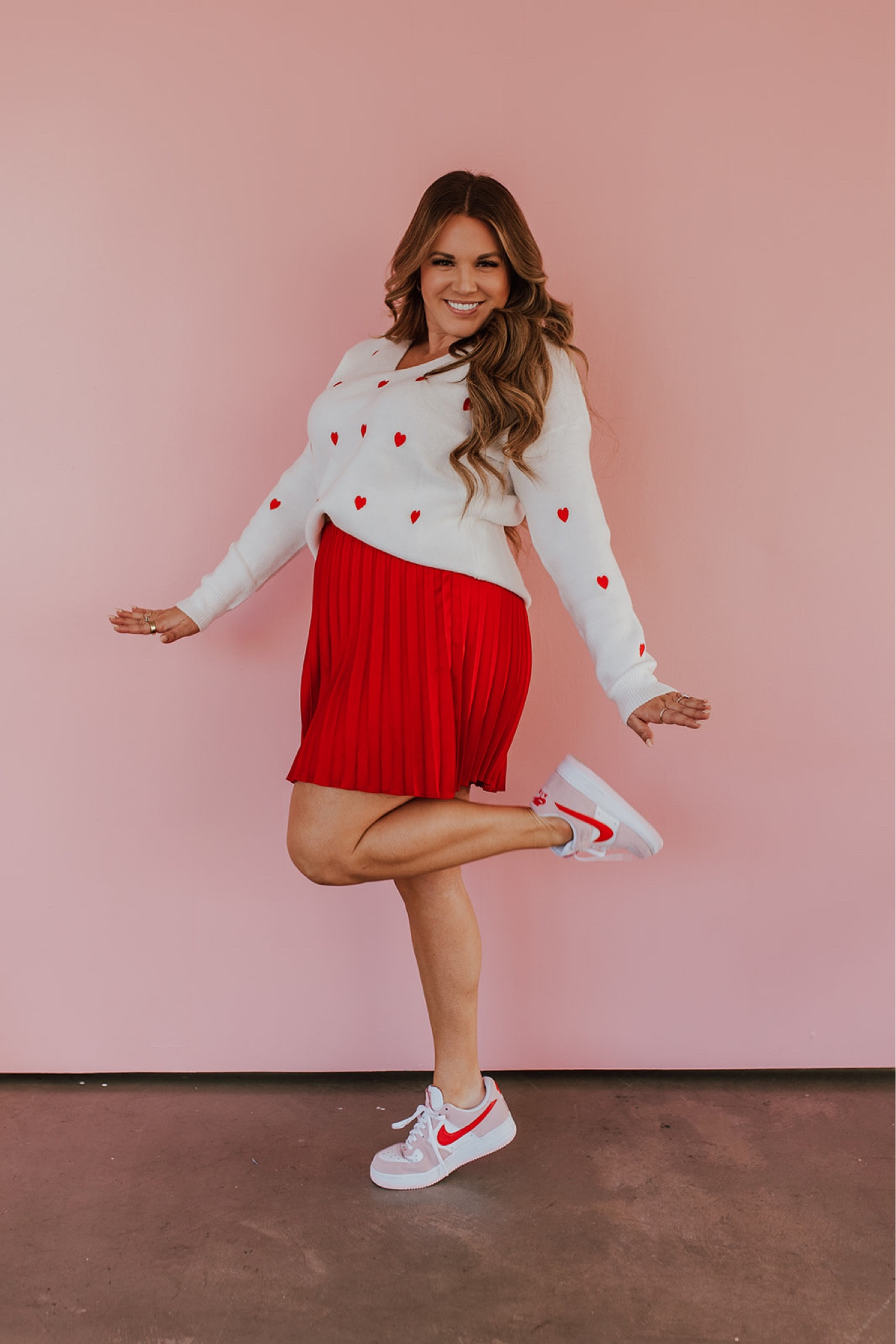 curvy Valentine look! wearing size large in red tiny heart sweater and red skirt 

#LTKSeasonal #LTKunder50 #LTKcurves