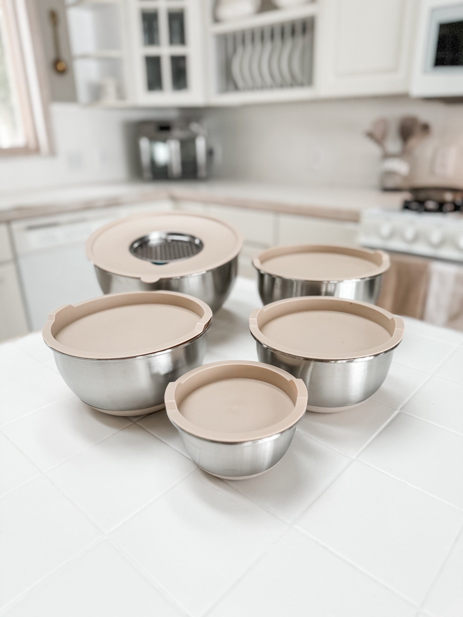 Neutral mixing bowls that are as beautiful as they are functional.
This stacked stainless set includes multiple sizes plus a smart insert for using a hand mixer or grating cheese and vegetables directly into the bowl.

They keep my kitchen looking calm, clean, and elevated—even when they’re just sitting on the countertop.

Practical… but make it pretty. 🤍

#LTKHome #LTKSeasonal #LTKfoodie