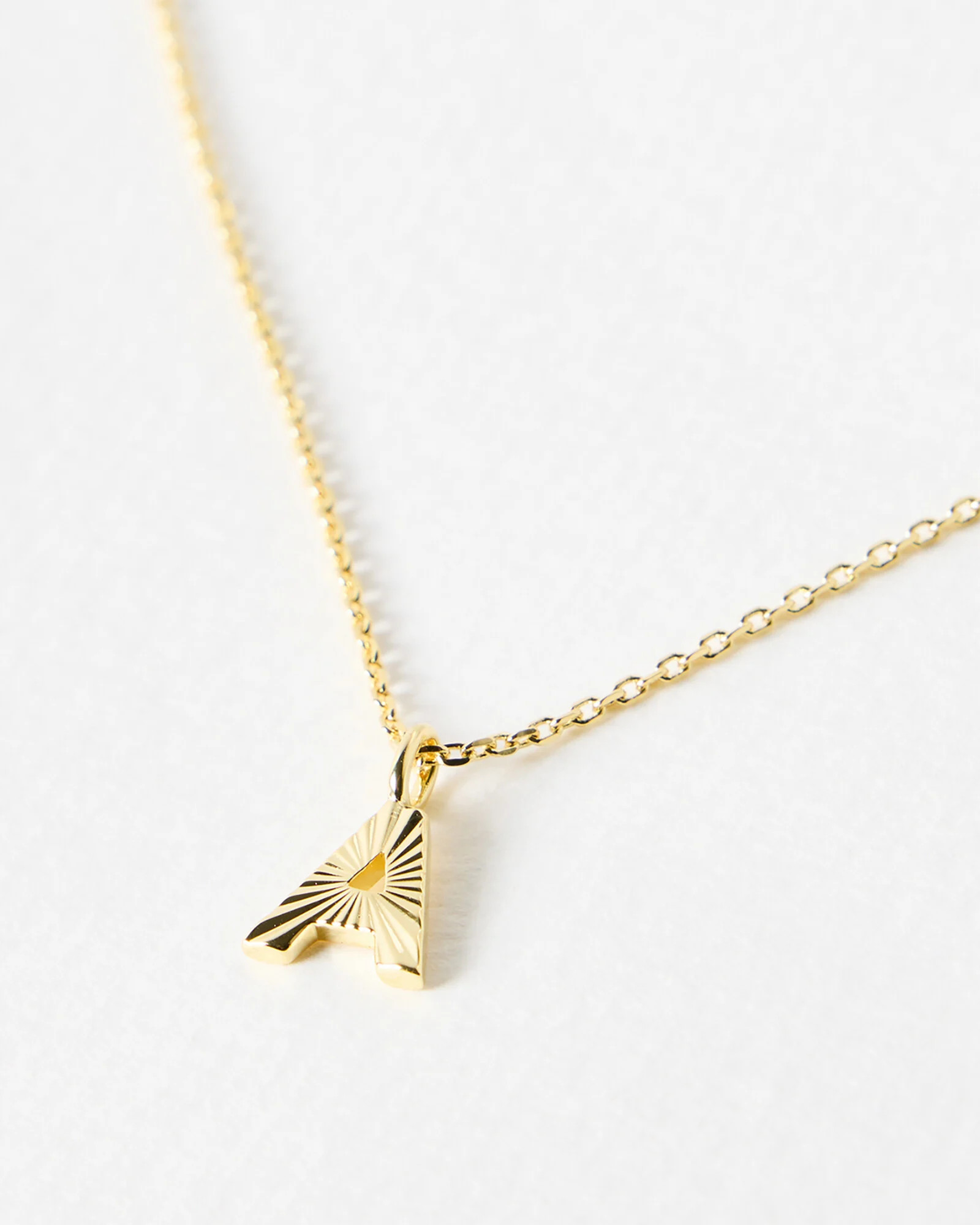 Alphabet Machine Engraved Initial Gold Plated Pendant Necklace | Oliver Bonas | Oliver Bonas (Global)