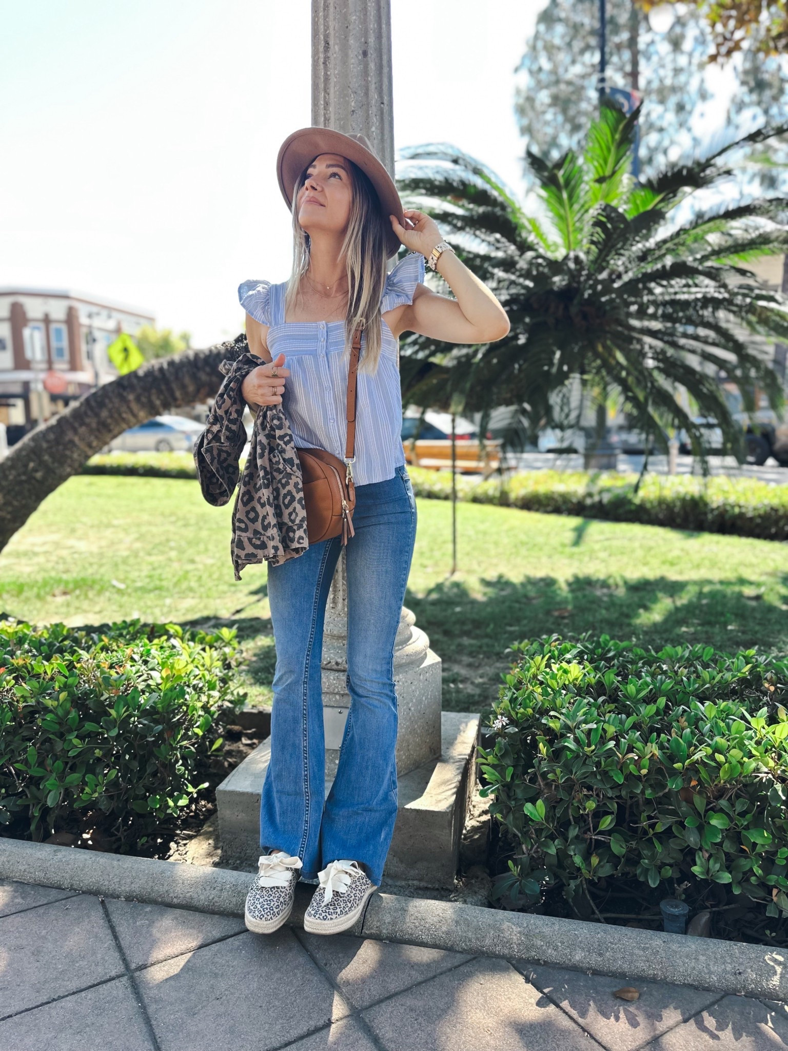 Obsessed with this outfit. It’s like a subtle throwback with the flare jeans mixed with fun leopard / cheetah pattern! 

#LTKSpringSale #LTKootd