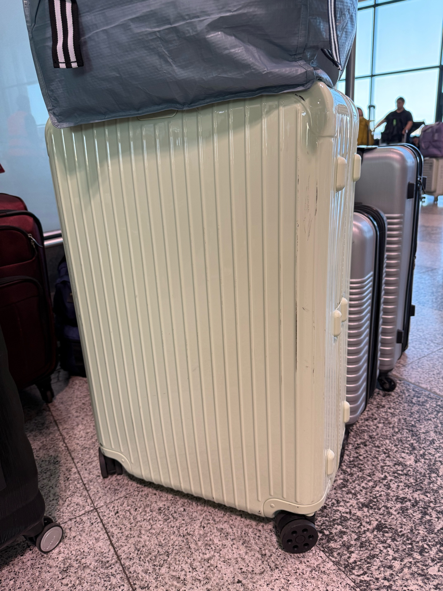 Obsessed with my rimowa bag. This limited edition color is apart of their Papaya collection. 🤭