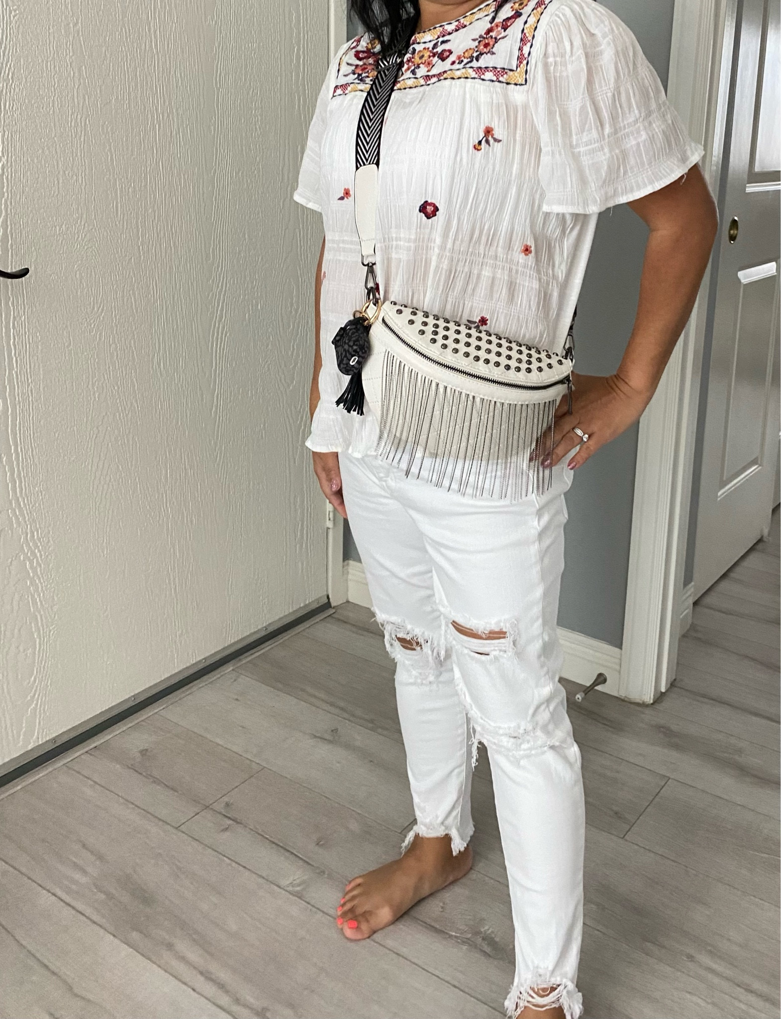 White studded crossbody bum bag style! Adjustable straps! So rocker boho! You’ll need a shorter strap to wear as a true fanny pack. 

#LTKitbag #LTKstyletip #LTKFind