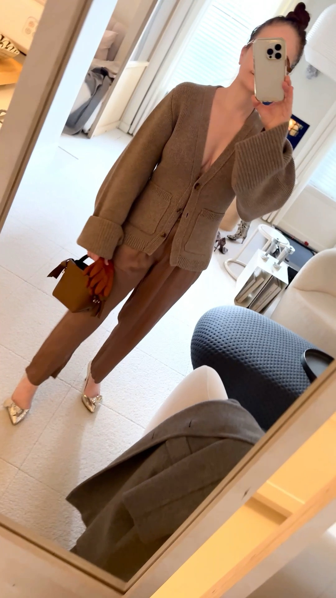 i love tone on tone with my favorite most worn khaite cardigan in wheat /brown. i have the black + avacado ones as well but this is the color i constantly grab.

they're perfect with these racquel allegra pants scored on the real real. though i wear them with blue jeans most days.

another thing i have in multiple colors (and sizes) is the acne studios musubi bag, here in micro in brown. i love that it comes with a longer strap (not shown) so it can be a crossbody. it doesn't hold a lot but i'm not carrying much. 

#midlifestyle

#LTKStyleTip #LTKOver40