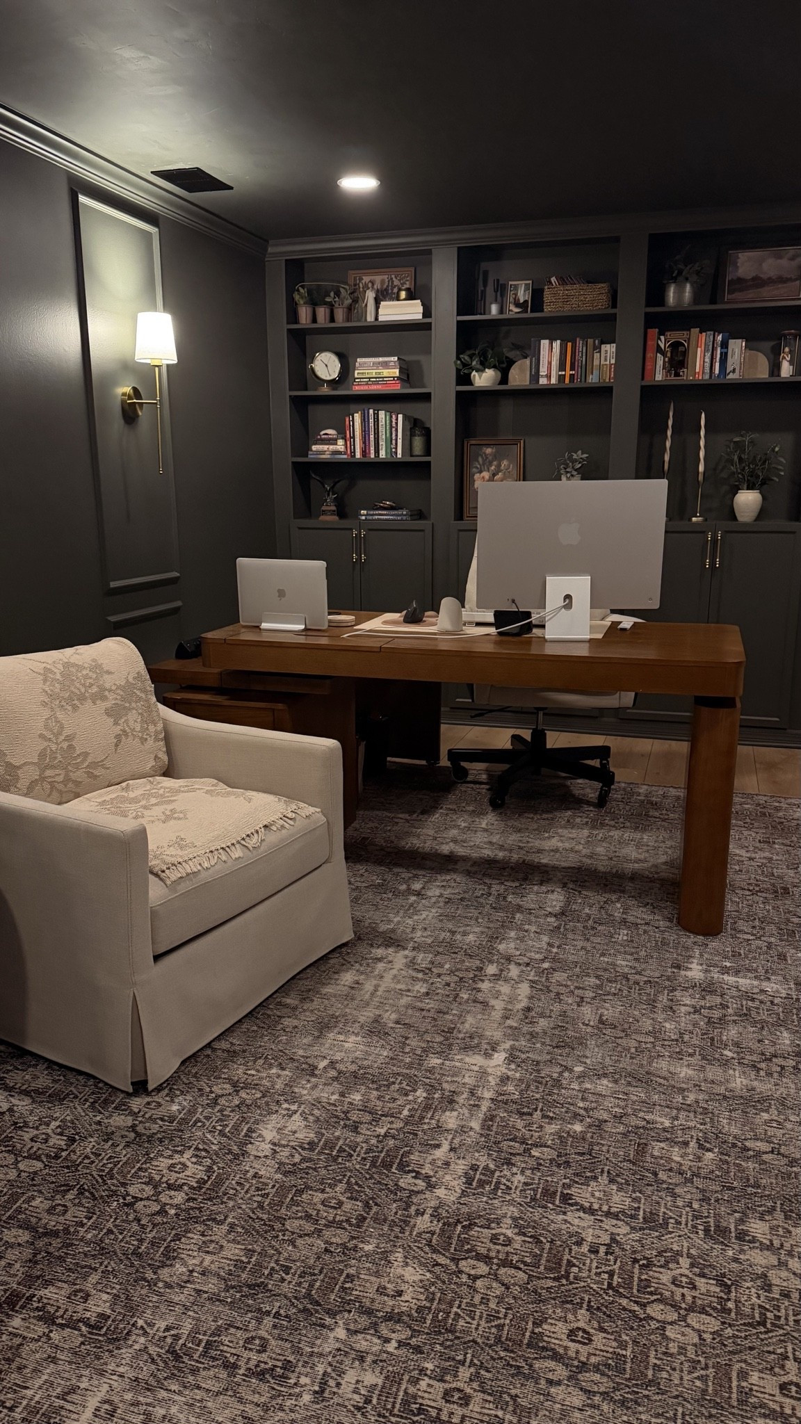 Moody home office 🍀 using the IKEA Billy bookcases hack. Color drenched in Benjamin Moore Ashwood Moss (eggshell on walls, trim, and bookcases and flat on the ceiling).

Desk is the HULALA HOME 360 Veritas Desk in the color acorn.

#homeoffice #moodymakeover #colordrenched

#LTKHome