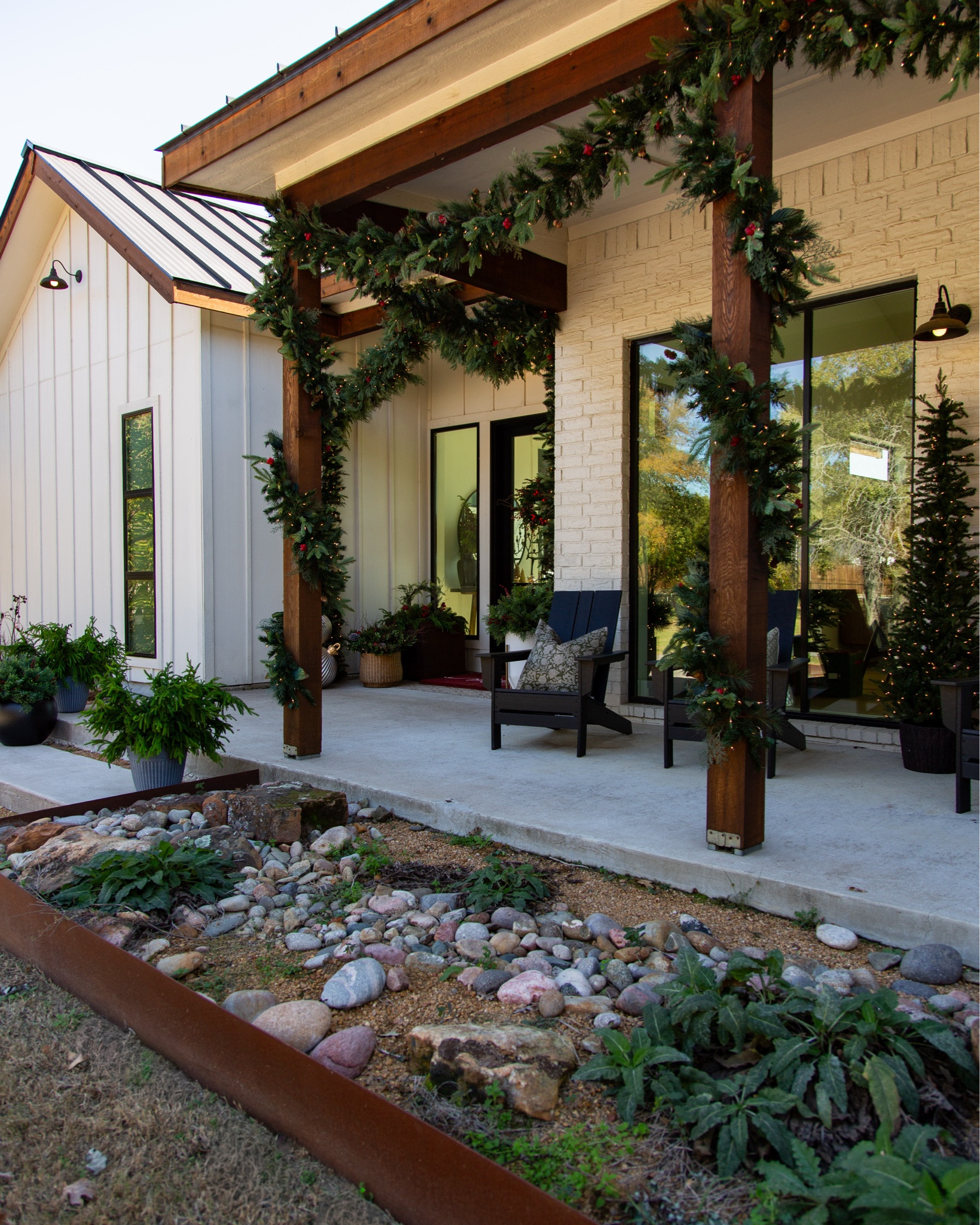 Our holiday front porch is officially dressed for the season, and it might be my favorite view of the whole house. The mix of fresh greenery, oversized garland, glowing lights, and those classic statement pieces makes the whole entry feel welcoming the moment you walk up. It’s cozy, timeless, and sets the tone for everything happening inside.

There’s just something about a decorated porch at Christmas — the glow, the layers, the textures, the nostalgia. If you’re looking for simple ways to elevate your own entry, start with full garlands, warm lights, and one or two eye-catching pieces that anchor the whole look.

holiday front porch decor, Christmas porch ideas, outdoor garland, holiday entryway, festive porch styling, Christmas home inspiration, outdoor Christmas decorations


#LTKHome #LTKHoliday #LTKSaleAlert