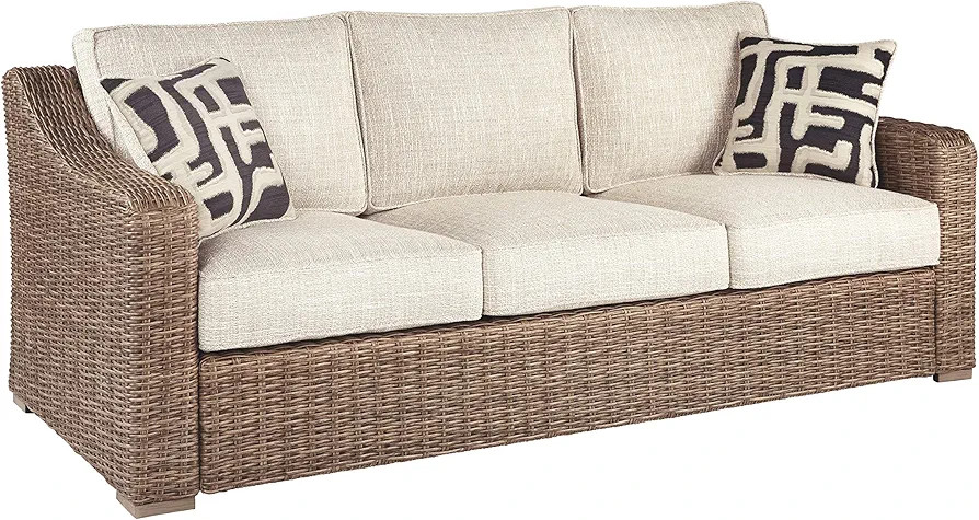 Signature Design by Ashley Beachcroft Outdoor Wicker Patio Sofa with Cushion and 2 Pillows, Beige... | Amazon (US)