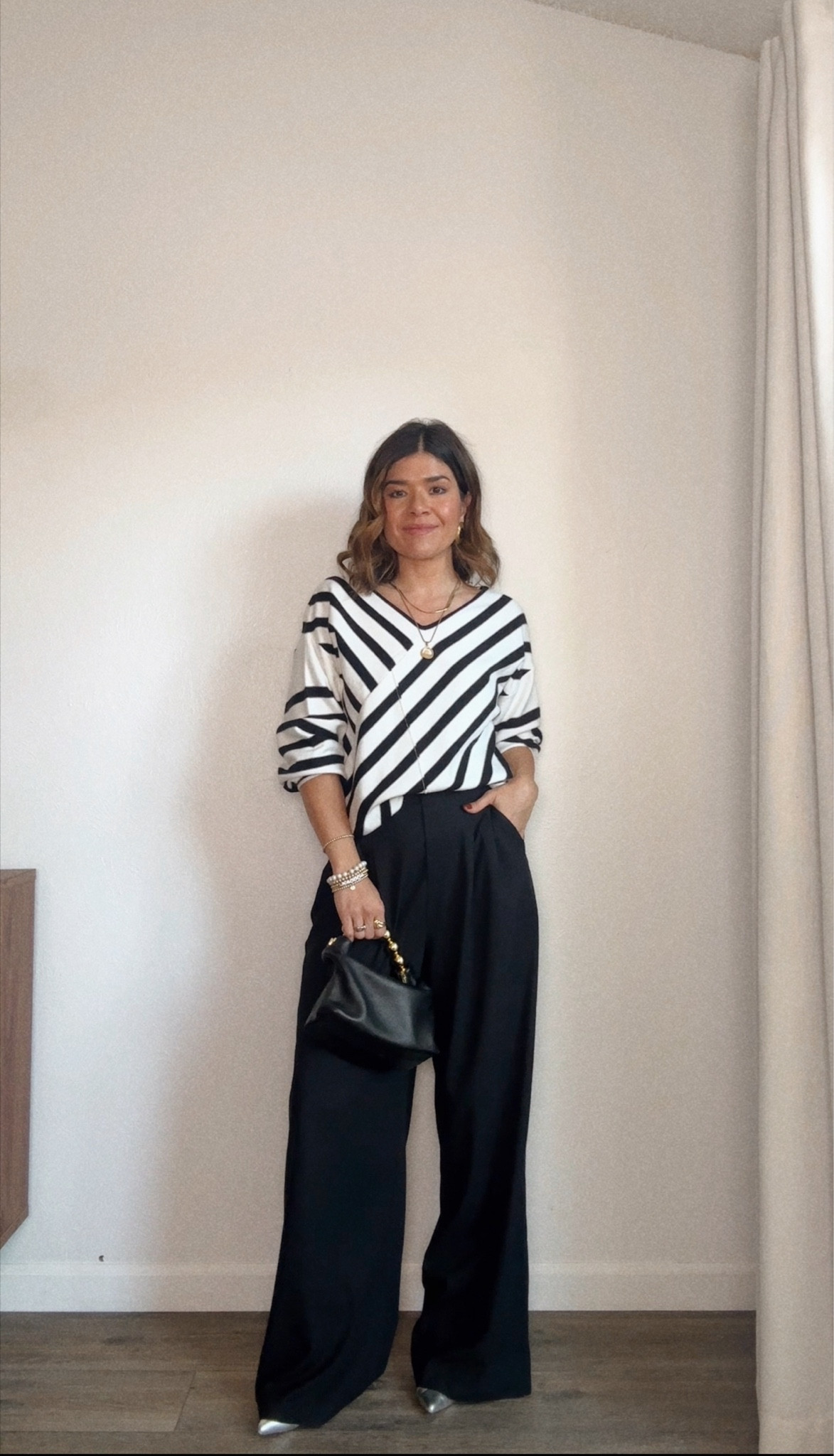 These black wide leg pants via Amazon have been a really good find! I love how flowy and chic they are! They fit tts, order your regular size. I’m wearing size small.
Sweater size small. 

#LTKFindsUnder100 #LTKSeasonal #LTKFindsUnder50