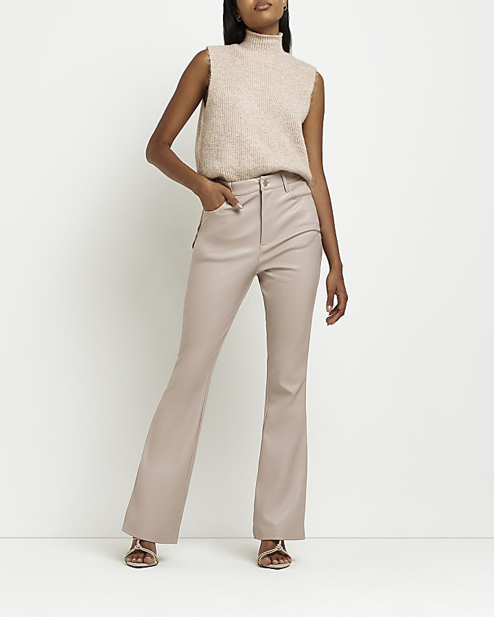 Beige faux leather bum sculpt flared trousers | River Island (UK & IE)