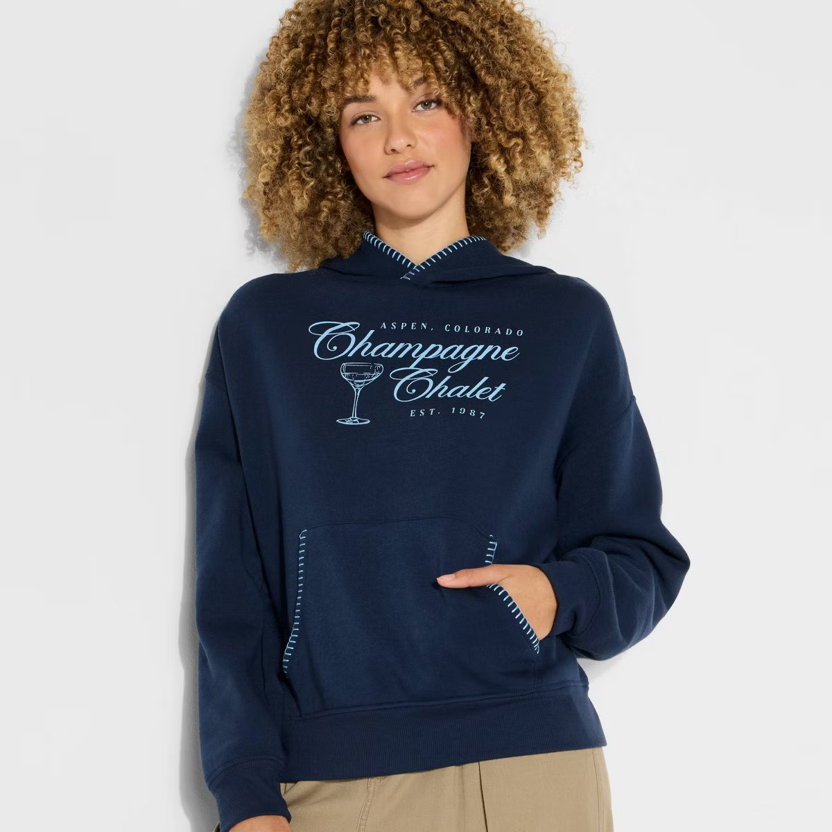 Women's Champagne Chalet Whipstitch Graphic Hooded Sweatshirt - Navy Blue | Target