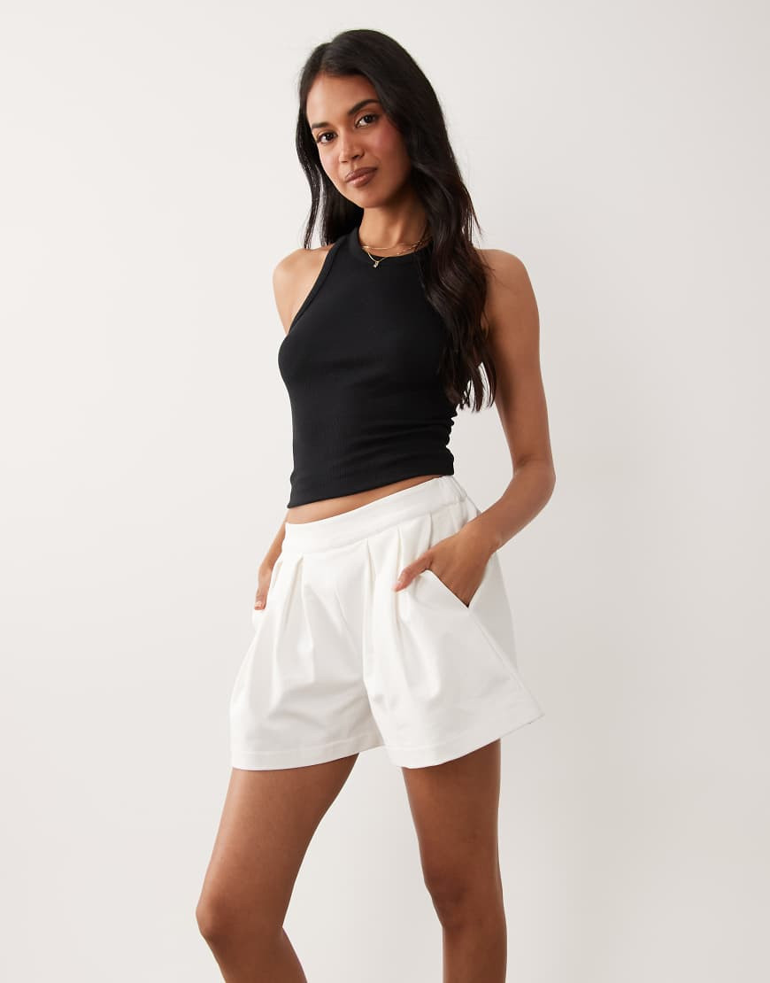 ASOS DESIGN cotton twill pleated shorts in white | ASOS (Global)