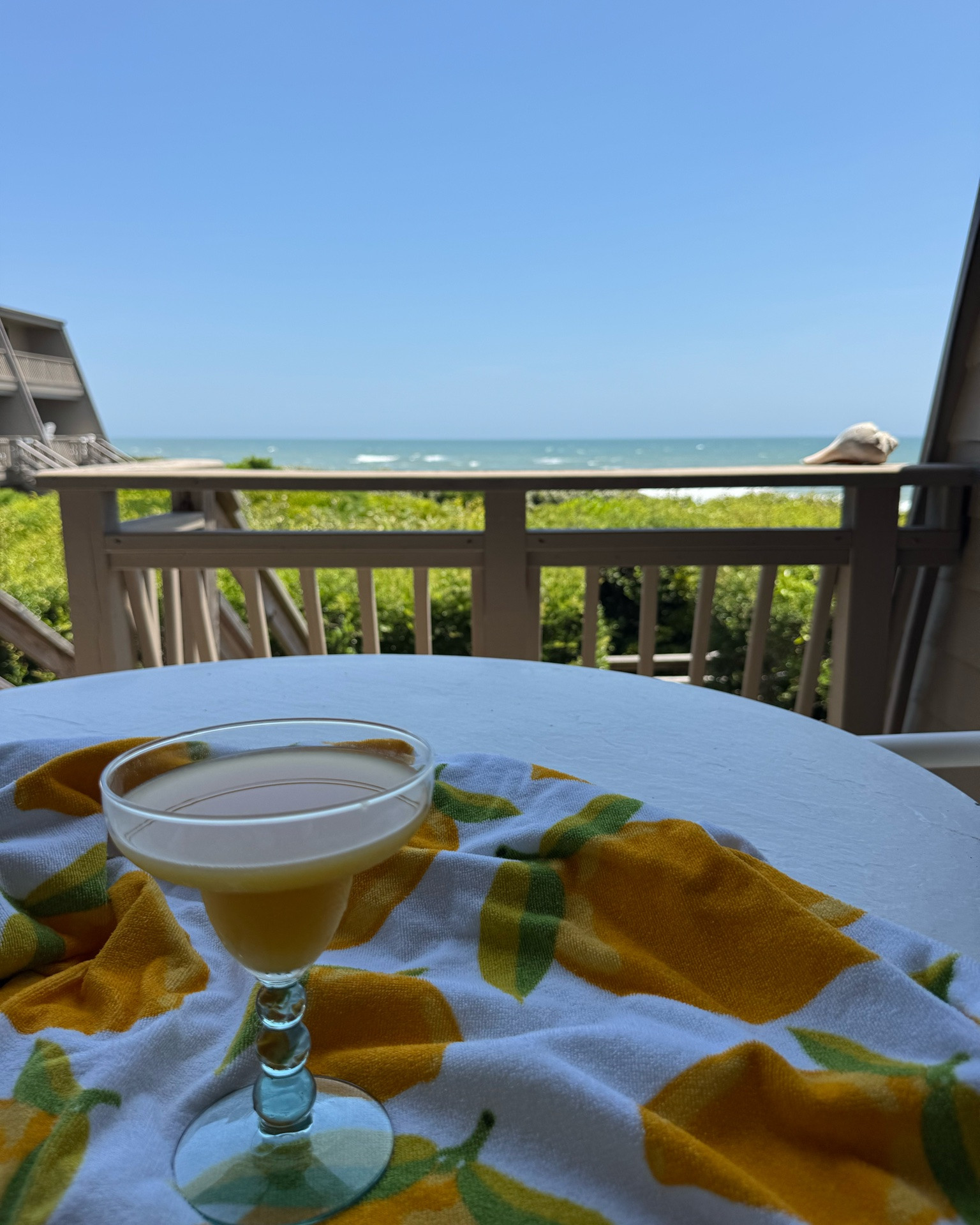 Beach vacation views from my deck last week 🏝️🌊👙☀️

Mimosa in a cute glass vibing with my lemon beach towel with the clear blue sky 🍋🍸🫶

Beach vacation accessories with a cute aesthetic are my favorite 🤩

#LTKTravel #LTKdayinmylife #LTKSeasonal