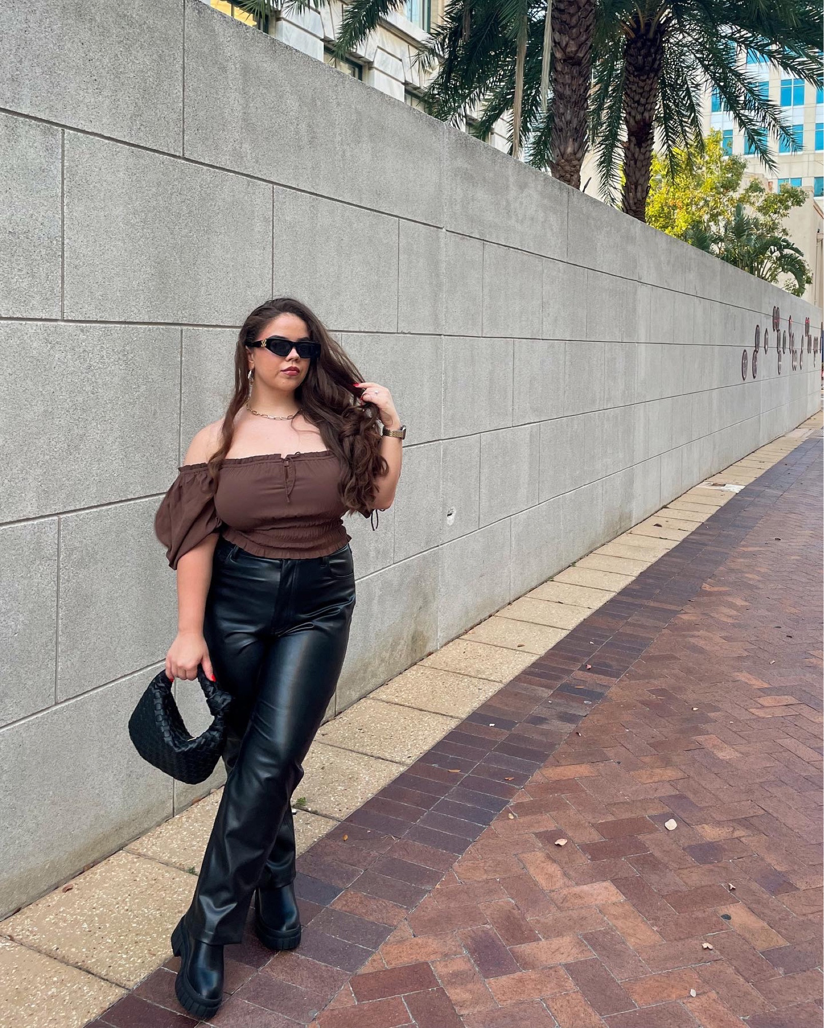 Falling for this color combo 🖤🤎 wearing a medium in the top and 31s in the Abercrombie leather pants. Boots, purse, and sunnies are Amazon

#LTKSeasonal #LTKstyletip #LTKunder100