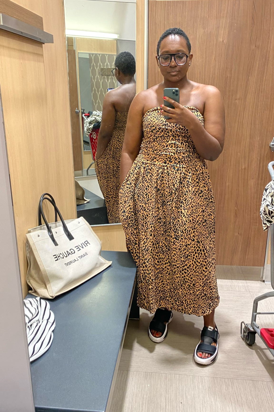 Loving this leopard number and can easily be transitioned over to fall by adding a blazer or denim jacket. Wearing a size large, but I can size down to a medium. It has size zippers and elasticity in the back. 