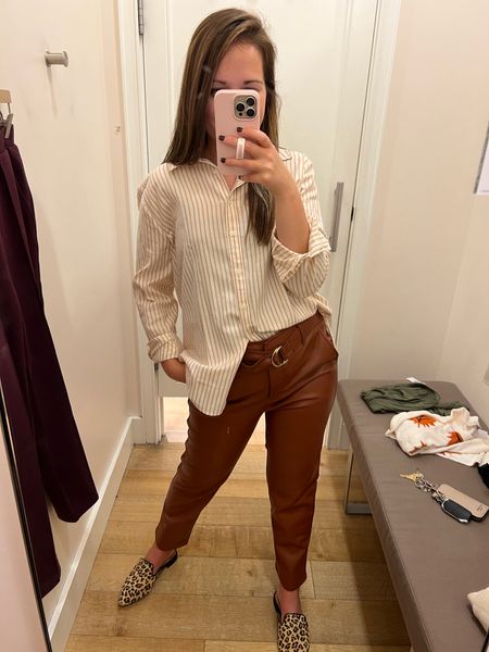 Dress up leather pants for work with an oversized button up. I’m loving vertical stripes this week and this rust color is a good monochromatic match with the pants!

Sizing: top- tts (xs)
Pants- I size down 1 in loft pants (2)