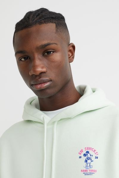 Soft sweatshirt hoodie with a double-layered, wrap-front hood with drawstring. Kangaroo pocket, l... | H&M (US + CA)