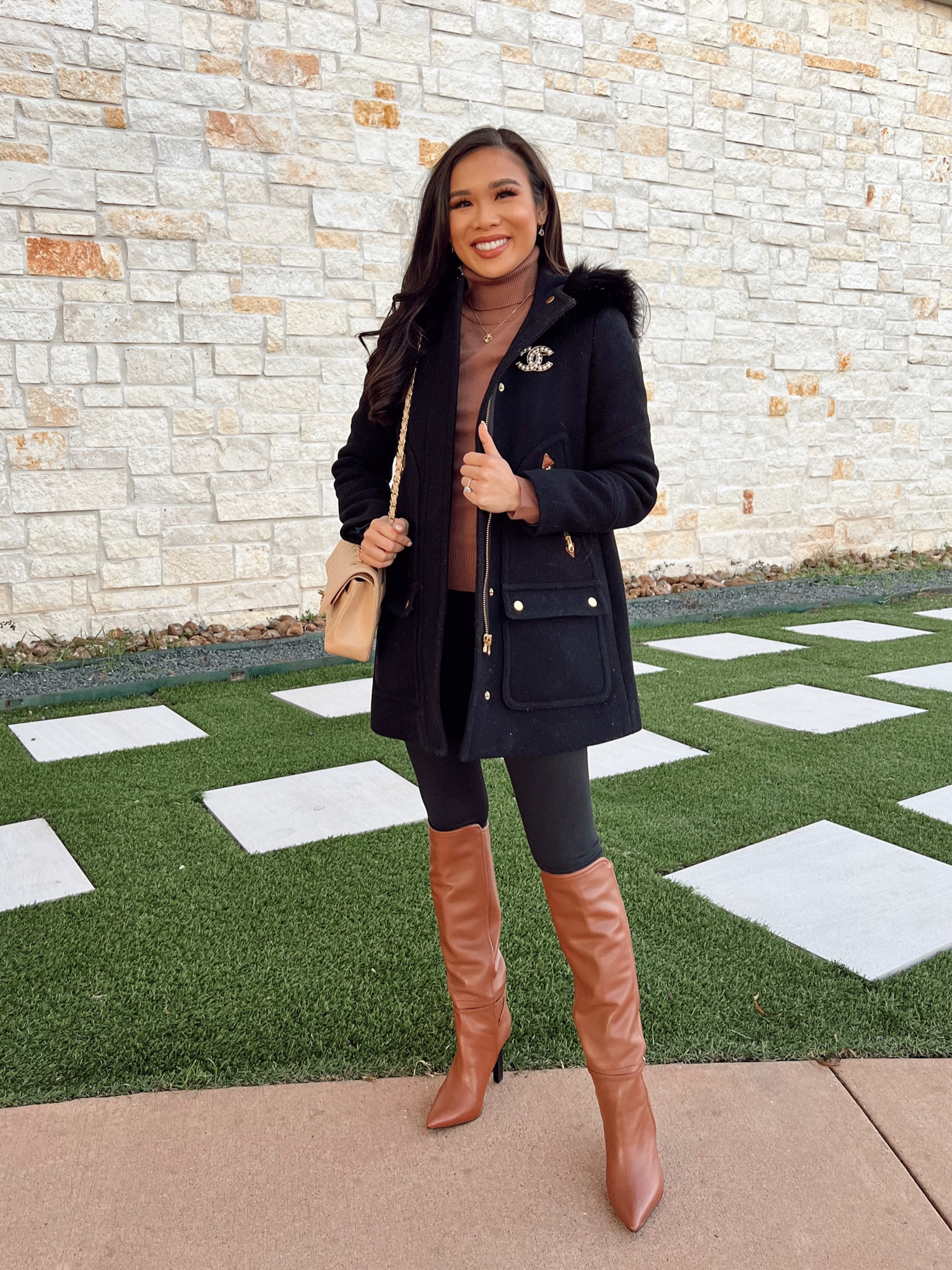 Fall outfit with a brown puff sleeve sweater and black Jcrew wool parka coat on sale for 48% off. Wearing size petite 00, it fits small in the armholes and has a swing silhouette. Pairing with black leggings and brown boots!

#LTKstyletip #LTKsalealert #LTKSeasonal