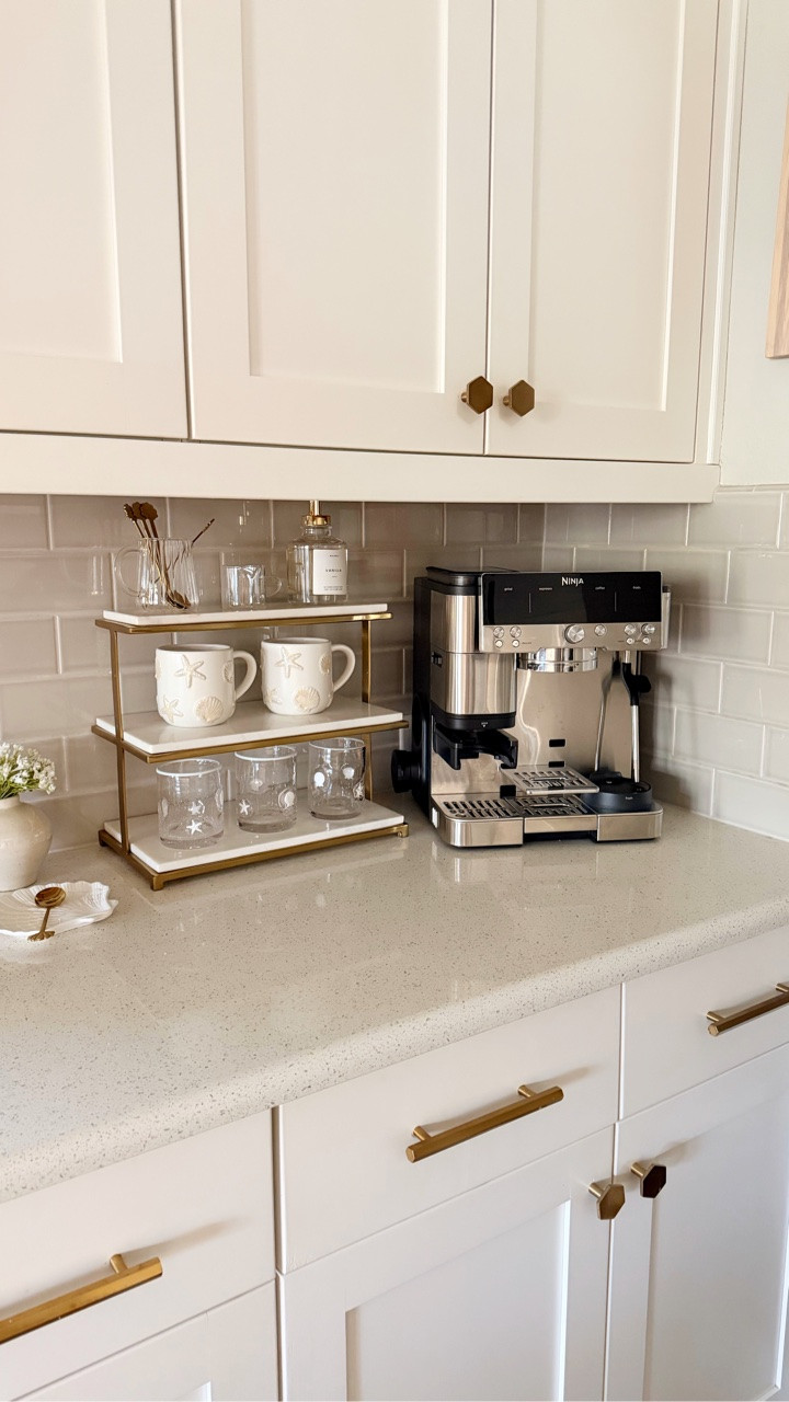🐚 The second I start dreaming about beach days and summer mornings, I end up giving little corners of my home a coastal refresh. I wanted this coffee corner to feel light, calming, and like a tiny beach café moment every morning. 🌊 

Follow me @threetimesahome for more cozy home inspiration and simple decorating ideas

#coastalhome #coffeecornerdecor #summerdecor #coastalstyle #coffeenook

#LTKmomlife #LTKSeasonal #LTKHome