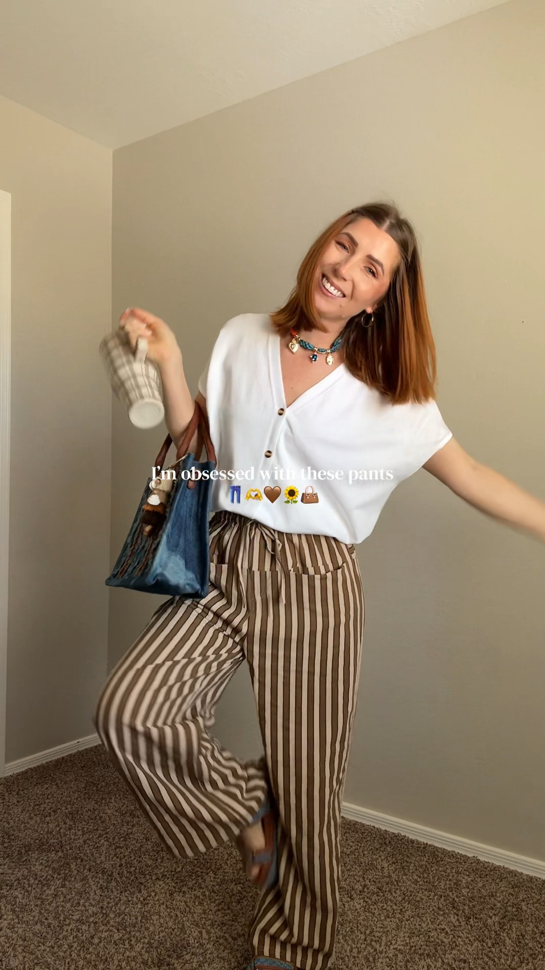 •white sleeveless button top: Virmoku sized up to a medium but honestly could have stayed in my true size small 
•brown and beige striped drawstring pants: sized down to a small and definitely glad I did because they are very oversized
•fun scarf necklace: Amazon 
•blue denim bag: structured, vibrant, comes with a body/shoulder strap. 
•gold hoop earrings: hypoallergenic, has a snap clasp in the back, and tapers slightly from thinner to thicker at the bottom of the hoop. 
•Wedding ring: Lab grown Masonite pear shaped with a halo band, hypoallergenic as well
•blue denim and leather platform sandals: Amazon, true to size, quite a heavy shoe,
Lots of Velcro straps to make it the perfect fit for you, sort of comfortable - I have a hard time finding the right strap position but I’m just a tender delicate girl 😂 

#LTKmomlife #LTKootd #LTKPetite