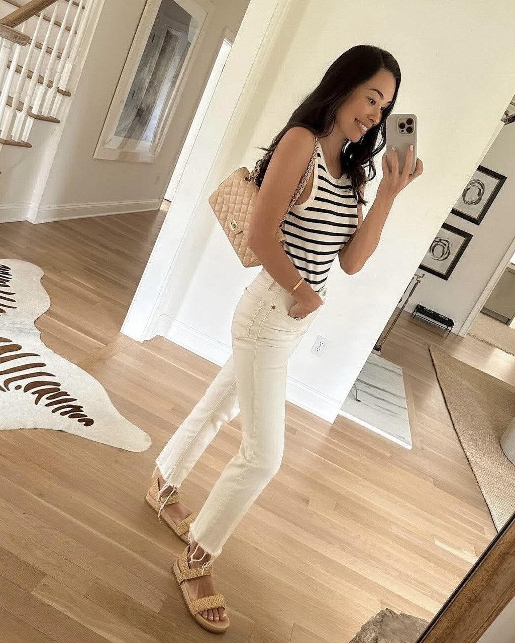 Bone colored denim jeans, cream jeans, ivory denim, sandals, stripe tank, classic outfit. 

#LTKSeasonal #LTKShoeCrush #LTKItBag