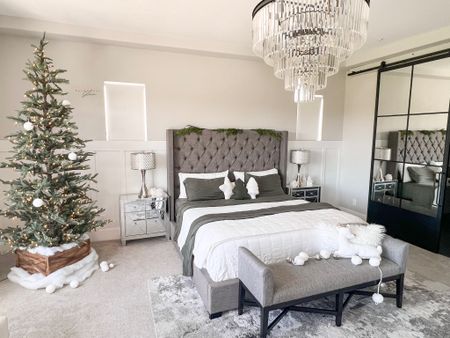 Christmas master bedroom at Modern Farmhouse Glam. 
40% off my bamboo sheets in olive green and sitewide at Cozy Earth with code FARMHOUSEGLAM40 

Pine Garland, Holiday decorations, Candy Canes, Winter wreath, stems, flocked Christmas tree, ornaments, holiday gift, Christmas tree trimmings

Master bedroom at Modern Farmhouse Glam. Tufted headboard, grey bed, furniture, mirrored nightstands, table lamp, neutral area rug, white rug, grey rug, barn door, chandelier, sliding metal door, bedroom furniture 


#LTKhome #LTKHoliday #LTKsalealert