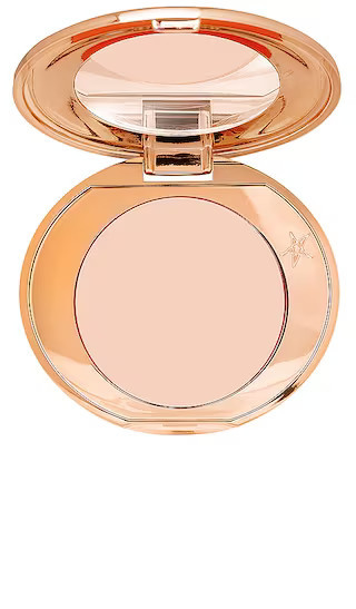 Charlotte Tilbury Magic Vanish Color Corrector in Fair. | Revolve Clothing (Global)