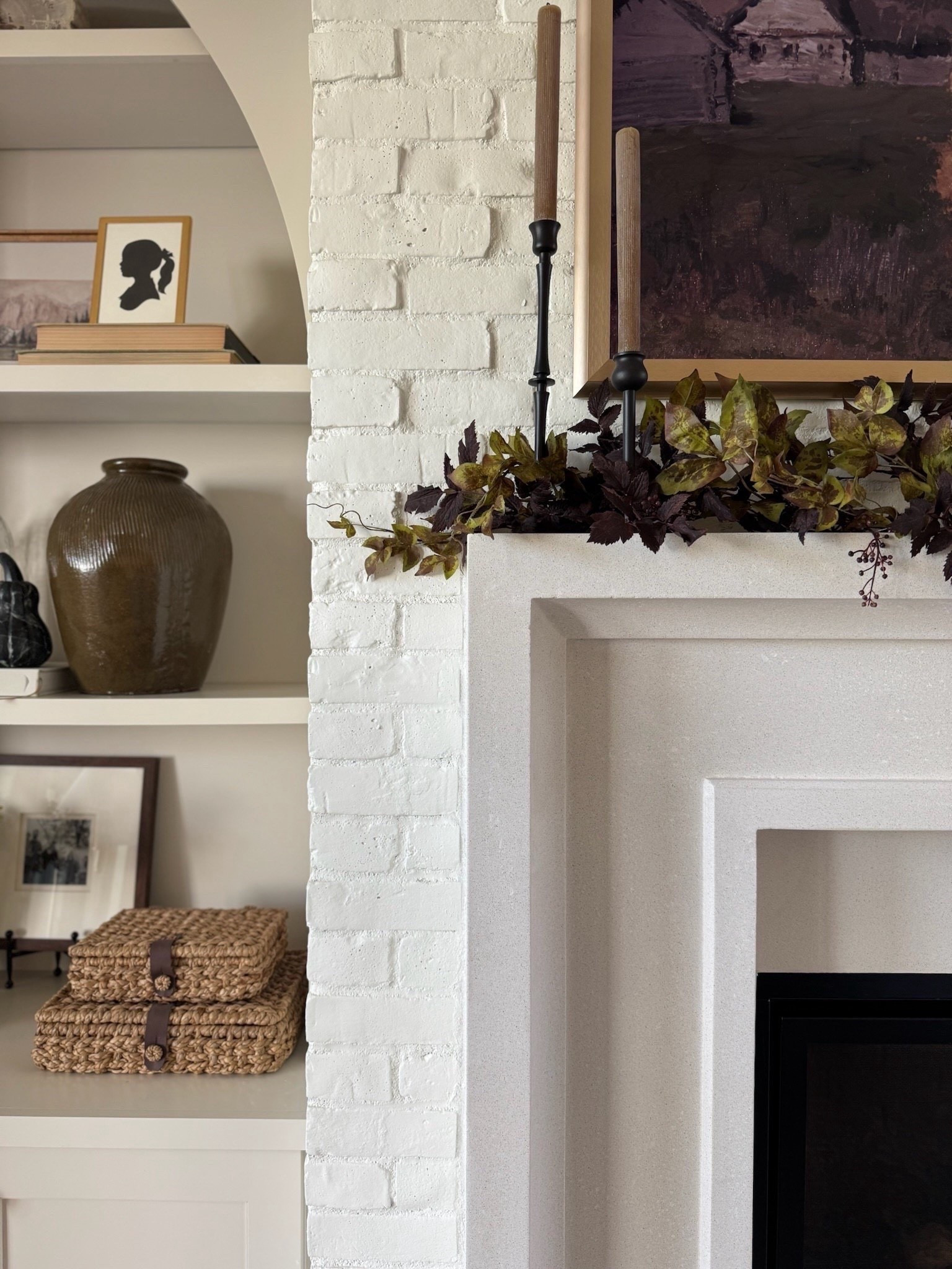 A rich and layered mantle look from last fall! I used a mix of garland and stems and couldn’t love it more.

#LTKHome