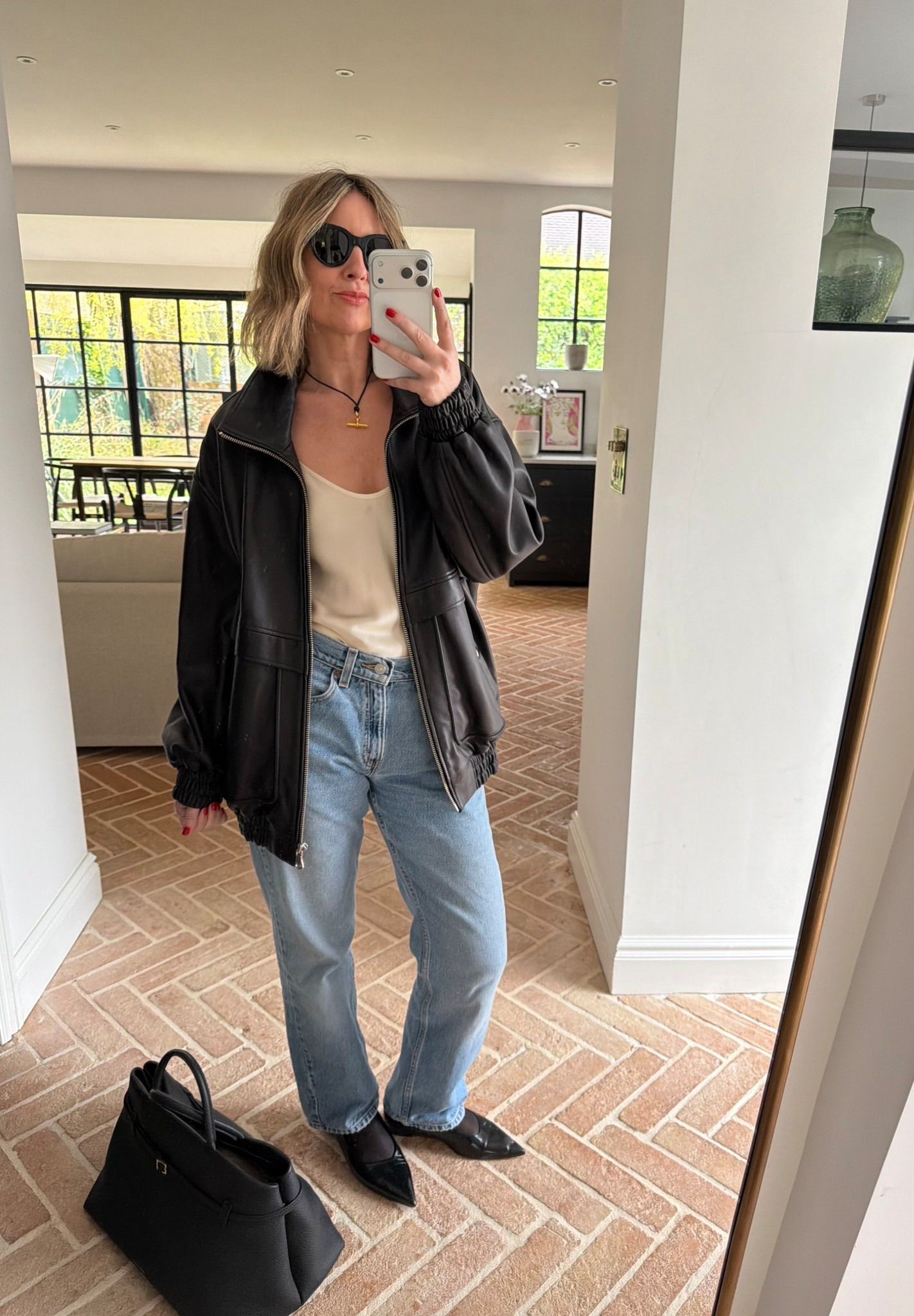 Silk cami + vintage Levi’s + leather bomber jacket 

#LTKspring #LTKuk #LTKstyletip