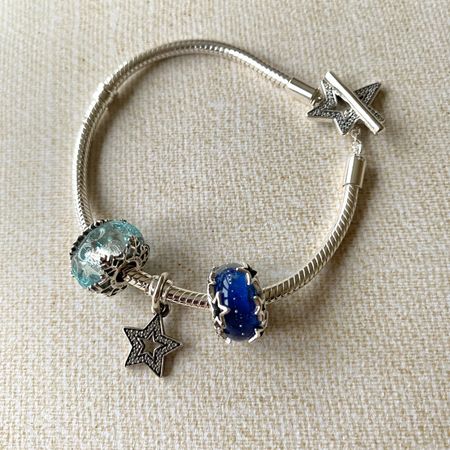 New Christmas additions to my Pandora collection. Pandora star bracelet. Pandora snowflake murano charm. Pandora stars Murano charm  

#LTKGiftGuide #LTKeurope #LTKHoliday