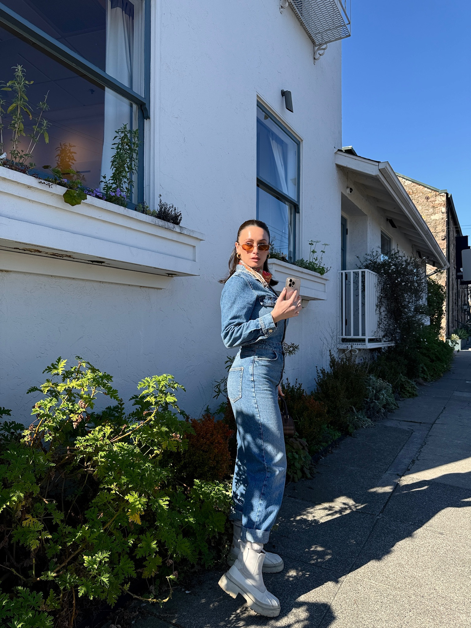 A lil denim jumpsuit moment. 

 #LTKootd #LTKmomlife