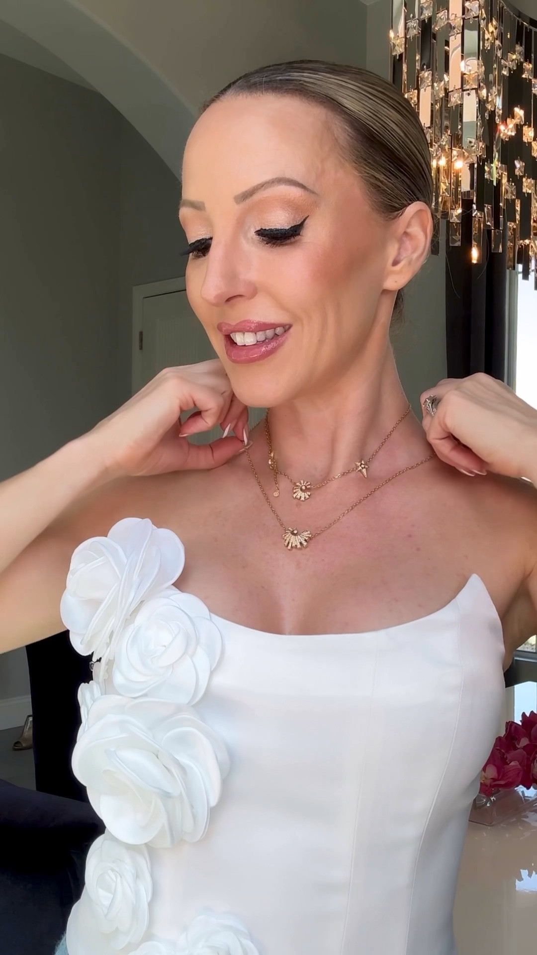 This strapless white corset top with flower appliqués is so on trend and versatile. Style it with jeans, white pants, white tailored shorts, black pants or a white skirt for a cute summer outfit or Fall outfit. I’m also linking these magnetic lashes and magnetic liner as I find them so much easier to deal with and especially to remove than glue on fake eyelashes.

#LTKStyleTip #LTKParties #LTKBeauty