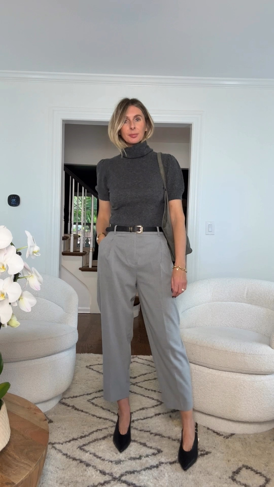 NINE TO FIVE style. polished…. professional. annnnd, heels that means business! comfy AND cool. now, go strut your ass into that boardroom! 📑✔️ 

SWEATER
soft. stylish. love the off sleeve. wear to work or with jeans. wearing the small. 👌

TROUSERS
beautiful quality. color and fit is INSANE. belt included! wearing the small. 🩶

HEELS
super cool! take them from the boardroom to the bar! i audis size down 1/2 size with target shoes. 🖤


office wear. what to wear to work. workwear. nine to five style. effortless office style. professional outfit. interview outfit. 
