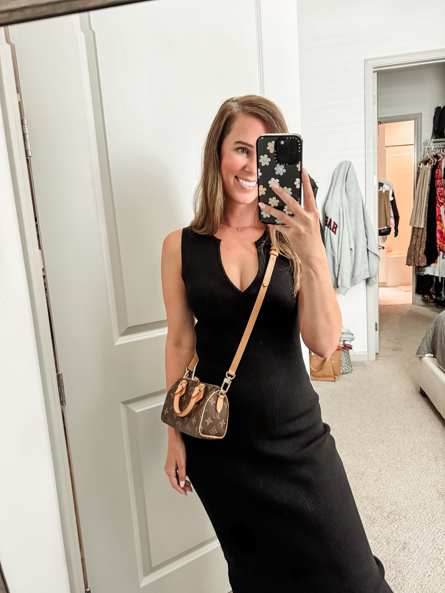 Black dress // midi dress // nano speedy // luxury purse // bag // purse // Louis Vuitton 

#LTKItBag #LTKStyleTip #LTKTravel