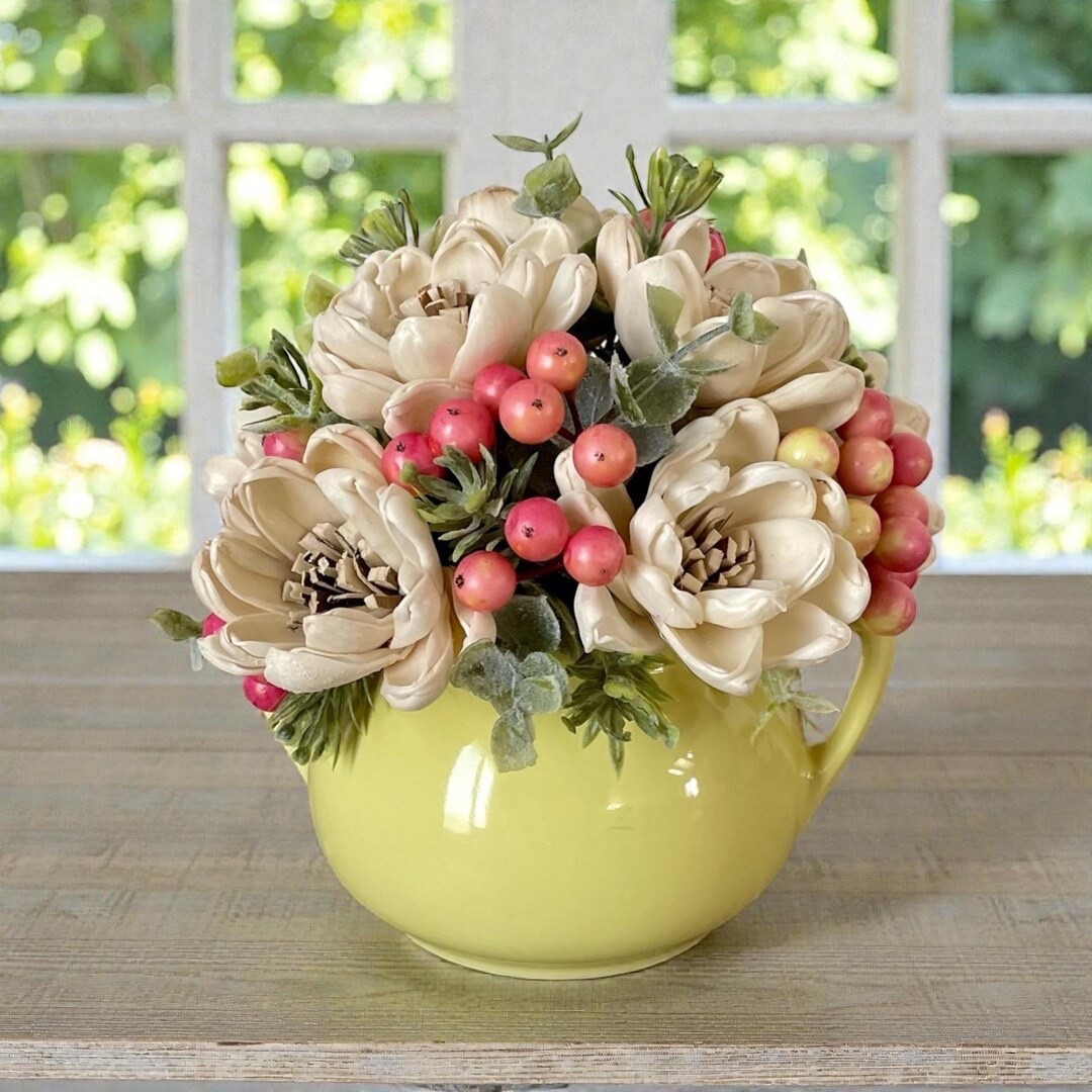 This charming 6.5” sola wood flower arrangement from TinyHouseDecor is a beautiful way to add lasting blooms to your space. Each flower is carefully handcrafted from natural tapioca root, then hand dyed and arranged into a petite bouquet perfect for wedding centerpieces, Valentine’s décor, or a thoughtful gift. The timeless look of these faux florals brings soft color and charm that never fades. #ltkhome #ltkfinds #weddingdecor #centerpieceideas #etsyfinds #floraldecor

#LTKHome #LTKSeasonal