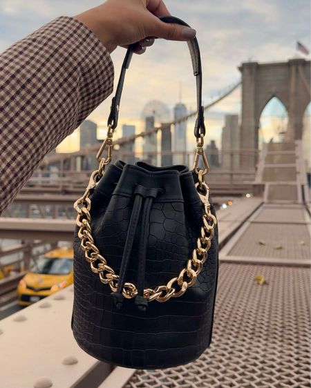 Allow us to introduce you to the @giginewyork x @hauteofftherack Brooklyn Bucket Bag! 

We’re so excited to launch our 4th handbag design together today! 

The Brooklyn Bucket Bag is crafted in matte embossed croc leather that I hand selected with you in mind!l & features 3 interchangeable straps including a lavish gold chain so she can be worn multiple different ways. Plus it’s the perfect size to for all of your essentials! She’s chic, timeless and right on trend for fall! 

Take 20% OFF with code: HAUTE20


#bucketbag #blackbag #nyc #brooklynbridge #brooklynbucketbag #workwear #falltrends #businesscasual #goldchainbag #fallhandbag


#LTKSeasonal #LTKitbag #LTKsalealert