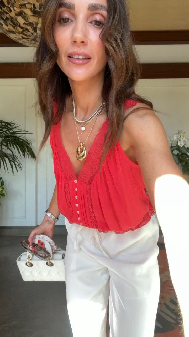 This flowy white pants and coral tank combo is the perfect vacation outfit. Lightweight, effortless, and easy to dress up with layered jewelry for dinner, drinks, or a tropical getaway.

Vacation outfit, Flowy white pants, Coral tank top, Resort wear, Beach vacation style, Summer outfit inspiration, Lightweight travel outfit, Tropical vacation look, Effortless summer fashion, annabrstyle

#LTKootd #LTKSeasonal #LTKTravel