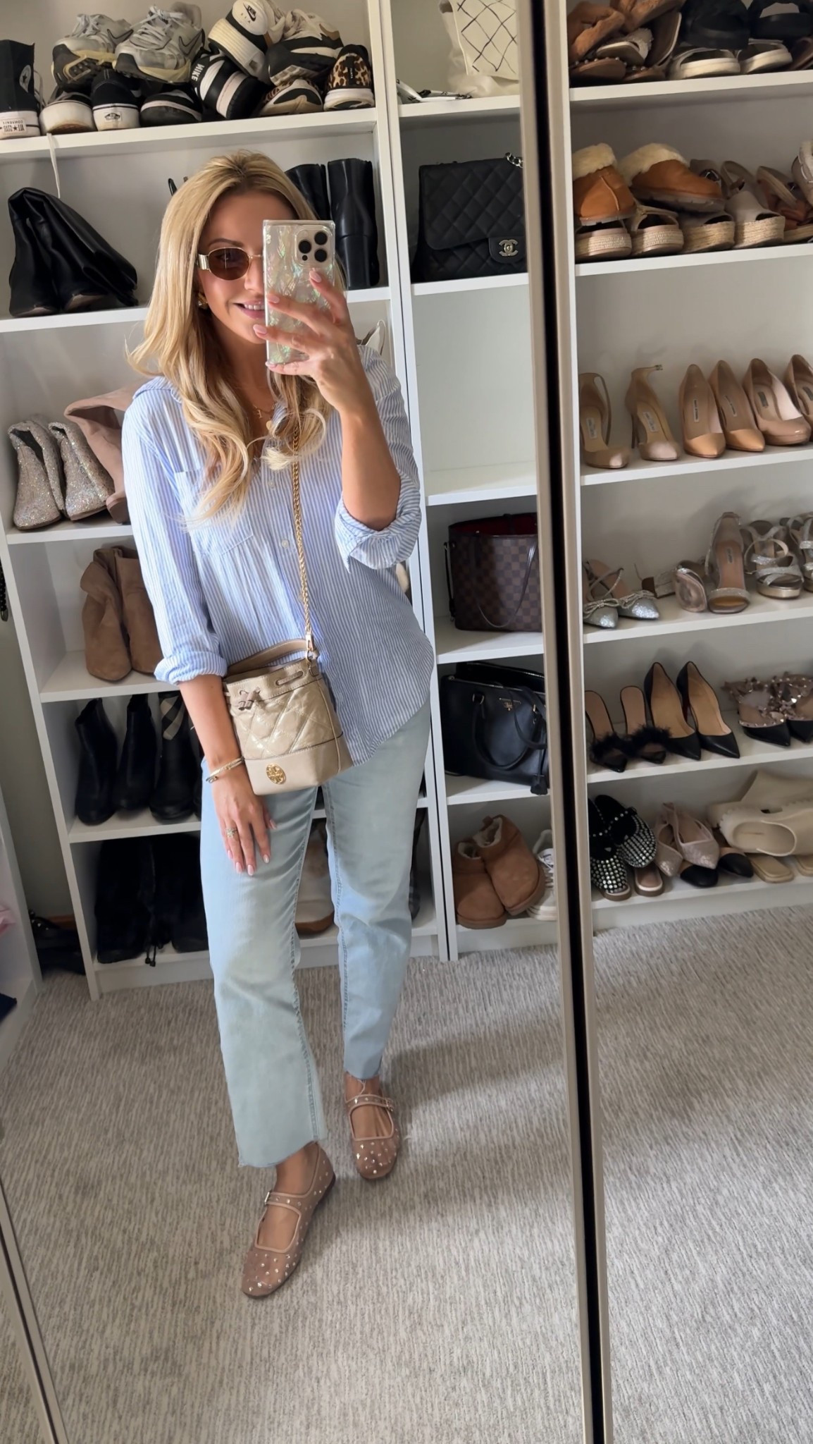 Spring style ootd statement earrings rhinestone mesh ballet flats gold sunglasses blue white button down oxford shirt light crop raw hem denim jeans 

Top: S
Denim: OAT brand linked (different color) 4/27

#LTKFindsUnder50 #LTKFindsUnder100 #LTKStyleTip